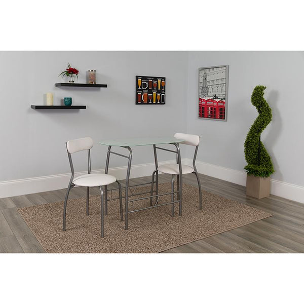 Flash Furniture Sutton 3 Piece Space-Saver Bistro Set with White Glass Top Table and White Vinyl Padded Chairs - XM-JM-A0278-1-2-WH-GG